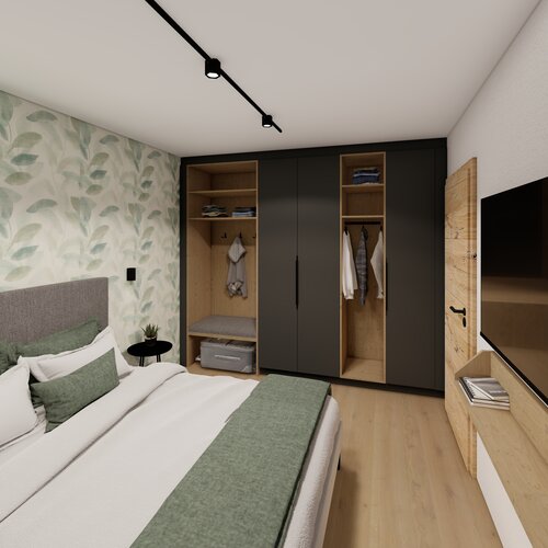 Bedroom with botanical wallpaper, platform bed, and built-in wardrobes