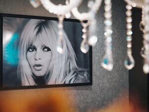 Framed black-and-white portrait of a blonde woman